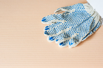 Work gloves with blue rubber dots