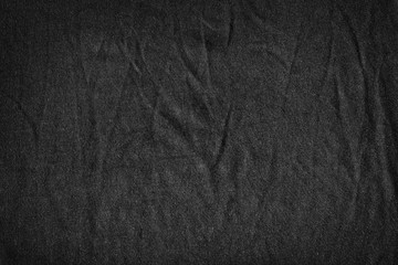 Black high detailed canvas with delicate striped pattern. Black fabric background.