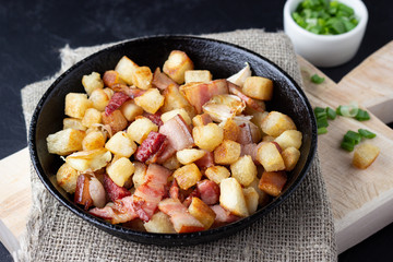 Traditional dish of Spanish cuisine - migos from bread.