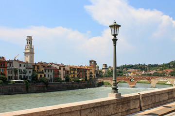 Verona old town in Italy with historical architecture and the river on a clear summer day