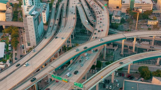 MIAMI, FLORIDA, USA - MAY 2019: Aerial drone view flight over Miami downtown. Road viaduct and overpass from above.