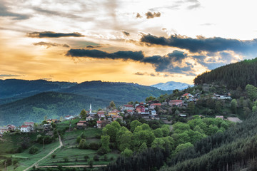Spring sunset over Sveta Petka village in Rhodope mountain, Bulgaria