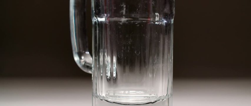 pour beer into glass