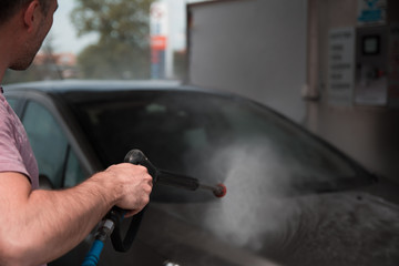 Car wash with pressure washer