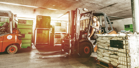  Warehouse man worker with forklift. 