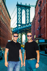 Tourists models posing and enjoying New York City and Dumbo, Brooklyn