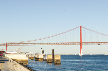 Fototapeta na wymiar part of red 25 april bridge in Lisbon