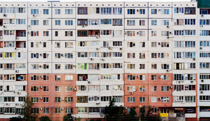 windows of a multi-storey building in Russia