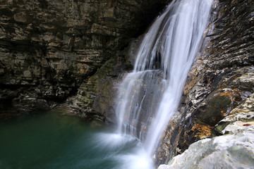 Fototapeta na wymiar Caucasus. Waterfall in Tsebeldinsky gorge near the village Olginskoye.