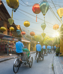 Historic HOIAN town paper lanterns and bicycle taxis, is a touristic tool for visiting historic...