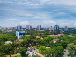 Modern residential buildings in Accra, capital of Ghana. Modern view. Suburb lifestyle in developing countries. Beautiful urban landscape. Top view. Wonderful houses and green areas - obrazy, fototapety, plakaty