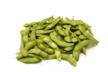 A pile of fresh soybeans on white