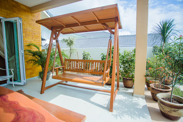 wooden swing on the porch