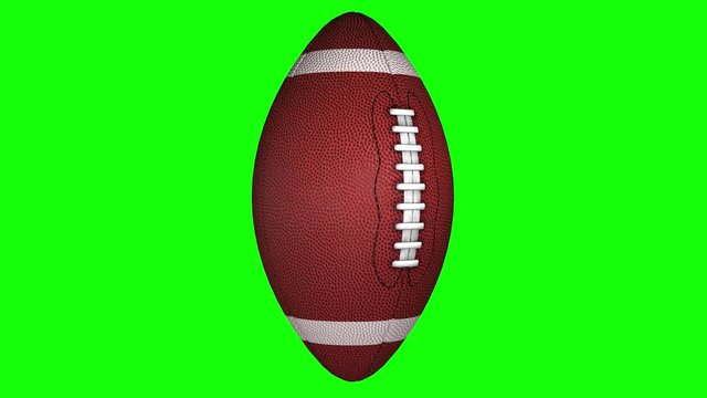 3D animation of american football ball rotating on transparent background.