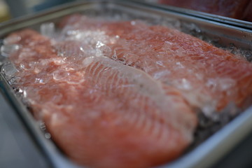 Fresh meat  in the refrigerator. Meat in the ice