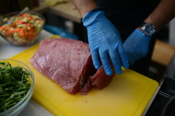 Making food in restaurant. Proffesional cooker.