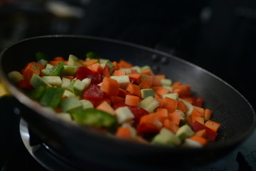 Making dinner at restaurant. Proffesional cooker