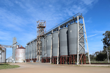 metal grain silos at a storage depot in rural Australia © Kim Britten