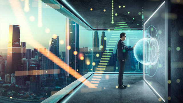 Businessman in suit working with virtual 3d holographic interface screens . Futuristic business, technology, internet and social networking technology concept .