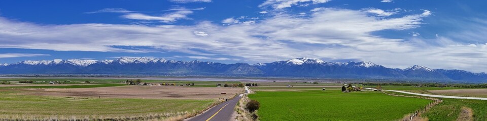 Tremonton and Logan Valley landscape views from Highway 30 pass, including Fielding, Beaverdam, Riverside and Collinston towns, by Utah State University, in Cache County along the Wasatch Front Range  © Jeremy