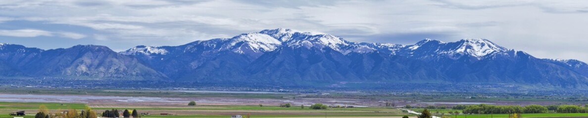 Tremonton and Logan Valley landscape views from Highway 30 pass, including Fielding, Beaverdam, Riverside and Collinston towns, by Utah State University, in Cache County along the Wasatch Front Range  © Jeremy