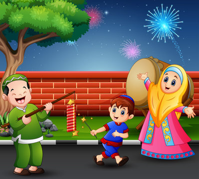 Happy muslim people celebrate for eid mubarak with firecracker