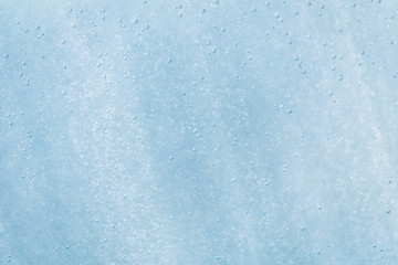 abstract blue and white bokeh and bubbles in the water