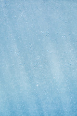 abstract blue and white bokeh and bubbles in the water