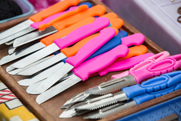 Lots of colorful knifes background