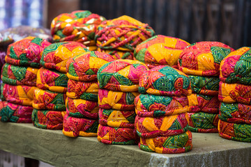 Fototapeta na wymiar Stack of colorful indian turbans in the market
