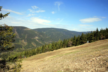 Beautiful panoramic view from the tourist attraction observation deck Stezka v oblacich or Sky Walk In the Czech village of Dolni Morava. Interesting places for tourism. View on czech mountain ranges.