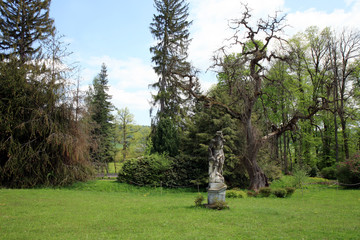 Garden’s sculpture of a mythological character in small, romantic place in Czech Republic, castle Velke Losiny. 