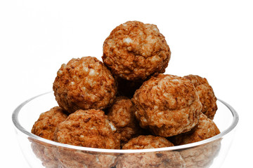 Roasted meatballs in a glass bowl