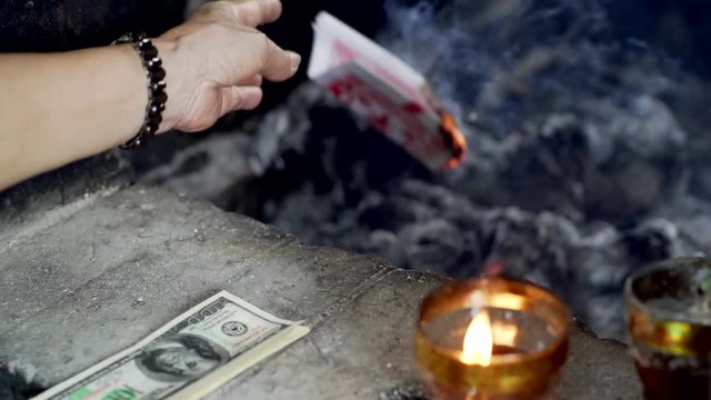 money burn in Vietnam buddhist temple