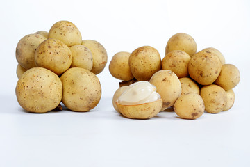 Lansium parasiticum langsat lanzones on white background 