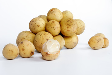 Lansium parasiticum langsat lanzones on white background