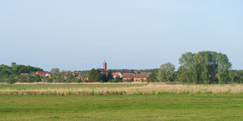 Fototapeta na wymiar View to the village Schollene in the nature park Westhavelland in Brandenburg