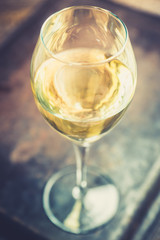 White wine on the rustic background. Selective focus. Shallow depth of field.