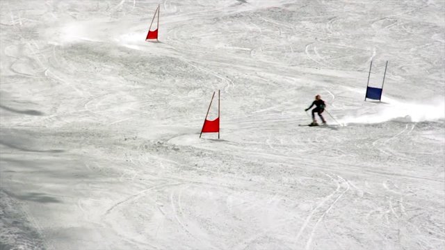 Downhill skiing in slalom competition