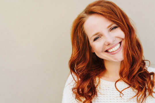 Close-up portrait of beautiful red-haired woman