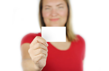 woman in red shirt with paper card
