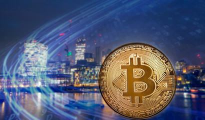 Bitcoins over blurred city
