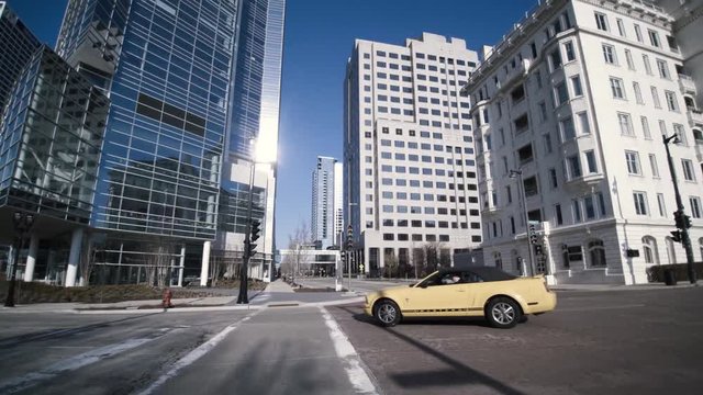 Street View Crossing the Street Towards Tallest Builing Downtown Milwaukee MKE Sunrise
