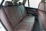 rear seats covered with fabric in a luxury car