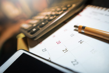 A pencil is placed on the calendar