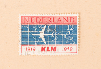THE NETHERLANDS 1959: A stamp printed in the Netherlands shows a KLM-airplane, circa 1959