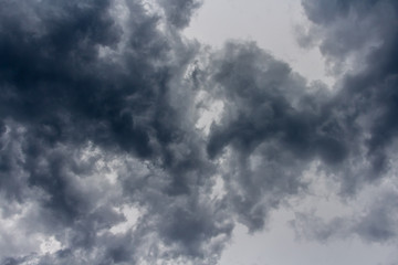 Fototapeta na wymiar original dark clouds before heavy rain. background of sky and storm.