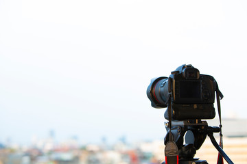 camera stand on Tripod with blur background