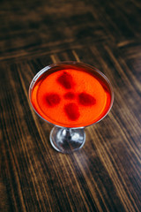 Jelly with fresh berries at the showcase