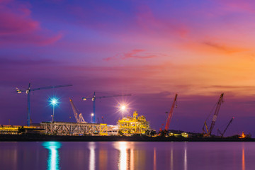 Silhouettes of crane the evening sky.